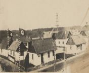 View of the Vorlager (German living quarters) of the Sobibor extermination camp, Poland, spring 1943. Seen in the background are the roofs of Camp I and the arm of the excavator which, starting in the autumn of 1942, removed bodies for cremation from thefrom the gay sisters 1942