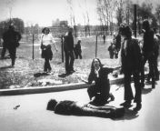 4 College Students Killed at Kent State University for Protesting Vietnam War. National Guardsman Claimed They Feared For Their Lives When Students No Closer Than 75ft Away Began Throwing Rocks. (1970) Mary Ann Vecchio screams as she kneels by the body of from college students lovers