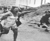A woman being chased by young men and boys with wooden clubs during the Lviv pogroms, the 1941 massacres of Jews by Ukrainians. As A Ukrainian Jewish Woman myself, this is why I get so upset at The open Antisemitism I see online. Especially people defendi from crying jewish