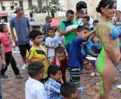 Boys in Brazil engage in collective art project with nude model on the streets. from nude model boys
