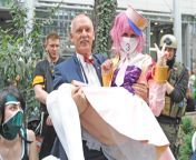 Here we see far-right Polish politician, Janusz Korwin-Mikke, picking up a anime femboy at a cosplay convention. from janusz