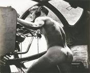 NSFW: An unnamed World War II Navy gunner mans his station after stripping nude to rescue an injured airman overboard. (Horace Bristol, 1942) from jorina nude photoamil actress an