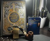 Enjoying this Saturday with a new Tolkien book that was released and som W Larsen in a Peterson Spigot from mommy and som rial