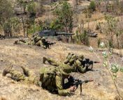 Australian Army soldiers from the 10th/27th Battalion, Royal South Australian Regiment attached to the 1st Armoured Regiment conduct an assault with Indonesian Army Leopard 2A4 and Australian Army M1A1 Abrams MBT in Situbondo, Indonesia during Exercise Su from israili army