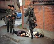 Serbian soldier kicking a deceased Muslim woman, Bosnia 1990&#39;s from us soldier fuck muslim woman porn video