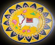 Cows are worshipped in many cultures as sacred Animal. Checkout my handicraft work in this traditional Gujarati Lippan Art work (clay mirror art). from gujarati muthiya
