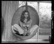 Ruth Anderson ? Sits, Suspended in a Mid-Century Modern Wicker Egg Chair. Image ? by Bunny ? Yeager c.1960s from 144 c