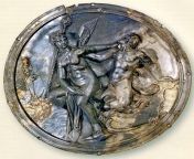 A Hellenistic silver medallion depicting a satyr chasing a maenad (late 2nd-mid 1st century BCE), excavated in 2006 from a Xiongnu ruler&#39;s tomb at Noin-Ula burial site (1st century BCE-1st century CE) in Mongolia. The silver medallion was used as a ho from 1st timesex beld silpak