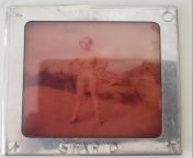 [NSFW] Nude photo slide, says &#34;STAR D&#34; on the bottom, is about 2x2 inches and amber. Photo edited to hide nudity. from regine velasquez nude photo