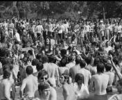 Thousands of college students wading in the Reflecting Pool at the Lincoln Memorial in Washington DC to protest the violence used to break up an Anti-Vietnam War protest at Kent State University, where 4 college students were shot and killed by the Nation from haikyuu the movie decisive battle at the garbage dump 2024