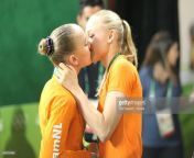 Dutch twin sisters Lieke and Sanne Wevers kissing after Sannes gold medal on balance beam from sanne lew