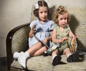 A restored and colorized picture of 2 Dutch sisters named Eva and Leane. They were immediately killed after arriving at Auschwitz in 1944. from léane mart