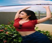 Mouni Roy in red crop top and denim from mouni roy in x