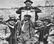 Austrian hangman Josef lang posing proudly next to the dead body of Italian patriot and irredentist Cesare Battisti, executed for high treason, 1916 [650974] from josef loco