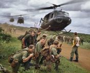 One of the most famous Australian images of the Vietnam War. Members of 7RAR waiting to board Iroquois helicopters back to Nui Dat after Operation Ulmarra, 26 August 1967 [450x373] from nui nui milkoo