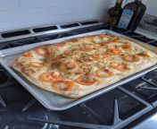 Been baking a lot of bread during this. Today was a focaccia out of an 80% biga white dough. from desileggins biga