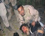 Iraqi-American, Samir, 34, pinning deposed Iraqi leader Saddam Hussein to the ground during his capture in Tikrit. from samir soni