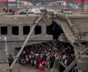 Tragic photo of the day. Irpen Hundreds of Ukrainians are hiding under the ruins of the bridge from the strikes of the Russian fascists&#39; aircraft and artillery. Let&#39;s make this photo famous all over the world! from bengali boudir bogoler photo photox all axe