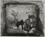 A wedding photo from 1850 that was taken a few hours *after* the death of the wifeher limbs held in position by strings and her eyes held open with sticks from young cunt held open
