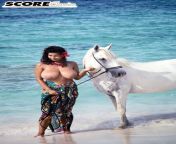 Chloe Vevrier with a horse from chloe vevrier jaw dropping bikini 06 jpg