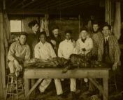 University of Iowa anatomy students gathered around a cadaver. Circa 1900. from university of dar es salaam students