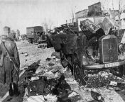 A Red Army soldier near a dead German soldier and broken German equipment in the village of Kastornoye. In the frame in the foreground is a Mercedes-Benz L1500 A, in the background is an Opel Blitz. 1943 from pujnabi village school enjoing in the classroo