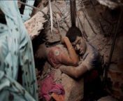 Final Embrace is a photograph showing two victims in the rubble of the April 2013 collapse of the eight storey Rana Plaza building in Savar Upazila, Bangladesh. from kabita rana