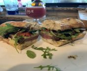 Homage steak sandwich with some leftover Wagyu under blade, mayo, horseradish, creole mustard, Swiss, arugula, tomato, and pickle on homemade sourdough hogue. from christrian hogue