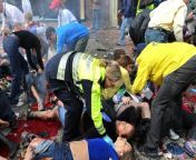 A paramedic checks Boston Marathon bombing victim Krystle Campbell for any signs of life. Campbell would be one of the three victims killed in two explosions that occurred near the finish line of the Boston Marathon. Her cause of death was due to blood lo from renee campbell