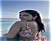 Malavika mohanan and her deep valley look how the water is flowing in between those globes from malavika mohanan hot nude fakes
