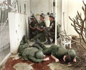 Two dead U.S. soldiers whit three U.S. military police taking cover behind a wall at the entrance to the U.S. Consulate in Saigon on the first day of the Tet Offensive, Vietnam 1968. from on the first night of the wedding i tried to seduce her sister when she came home