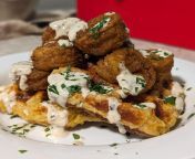[Homemade] A fun play on the concept of chicken and waffles; Cheddar Bay biscuit waffles with Old Bay seasoned fried shrimp drizzled with a pico crema and topped with parsley. from razia with old