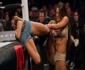 Nikki Bella stretching AJ Lee around the ring post from wwe aj lee xvideo