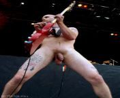 Nick Oliveri. Bass player with Queens of the Stone Age naked on stage. from naked mude stage