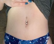 hi, i got my lower belly button piercing done yesterday. not sure of the piercers name but it was done at bini tattoo, toronto. top piercing is 3 years old for reference. im very happy with it :) from bini selin