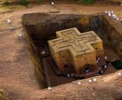 The Church of St. George in Lalibela, Ethiopia, is one of a number of hidden Christian Churches carved out of the bedrock in the late 12th or early 13th century AD and has been proposed as the eighth wonder of the world. from ethiopia vdeosx