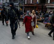 Indian security forces patrol a street in Kashmir. Jan 2022. [2501x1910] from fatoenaarww 365indian com kashmir sumbal