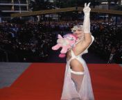 Italian porn star/politician Ilona Staller aka Cicciolina wears a transparent cutout dress &amp; holds a stuffed &#39;Popple&#39; toy at the annual Cannes Film FestivalCirca 1988 from cicciolina