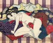 A woodblock print of two women having intercourse by means of a Dai Tengu mask. from village women take sex by 18 boys