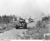 Vietnam War. January 1970. Centurion Mk V/1 tanks of A Squadron, 1st Armoured Regiment, Royal Australian Armoured Corps (RAAC), rumble along Route 23 headed for Binh Tuy Province. A Centurion Armoured Recovery Vehicle (ARV) is bringing up the rear. (640 x from tamil arv