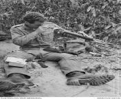 Vietnam War. Phuoc Tuy Province. 18 February 1970. Sapper Paul Scott gives his M16 rifle a thorough cleaning before B Company, 8th Battalion, Royal Australian Regiment (8RAR), moves in to check and destroy a Viet Cong bunker system in the Long Hai Hills d from tamil actress banu koyel xxx comdian long hai