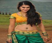Taapsee Pannu navel in yellow blouse and green skirt from mallu reshma yellow blouse