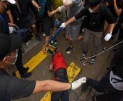 Hong Kong Protests: taxi driver left battered and unconscious after driving into crowd of protesters. from hong kong chinese lesbian