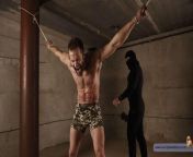 Hard flogging for the muscular and hairy beast. A pic from RusCapturedBoys.com video. from xxx10 com video