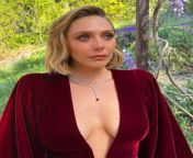 Looking at Elizabeth Olsen in this dress, I imagine pulling out her tits and drinking milk from them like a baby from drinking milk from goa