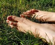 Big feet relaxing in the grass. I sure could use a massage. Will anyone worship my feet? from egyptian arabic lesbian falaka feet