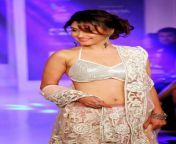 Manjari Phadnis sexy ramp walk in white and cream traditional attire from models nude ramp walk