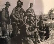 No.25 Patrol, F Troop, 2nd Squadron, Australian Special Air Service Regiment (SASR) and a US Navy SEAL at Nadzab Landing Zone after returning from their second nine day patrol, Vietnam. from crime patrol