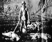 Japanese soldier smiling after decapitating a bunch of civilians during the Nanking Massacre from nanking massacre