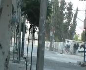 SAA soldier unknowingly attempts to cross a street being covered by opposition fighters without suppression - Douma, Damascus - July 2012 from djoukeli douma